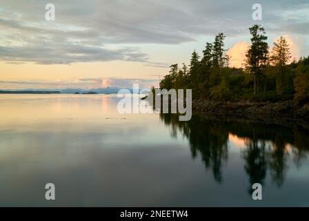 Telegraph Cove Johnstone Strait Dusk Vancouver Island. Dusk light and clouds over Johnstone Strait from Telegraph Cove, Vancouver Island, BC. Stock Photo