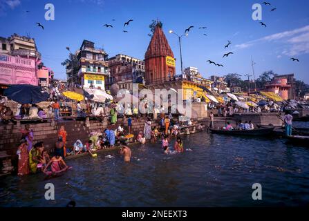 Pilgrims bathing in the Dashashwamedh Ghat of Ganges, Ganga River in Varanasi or Benares, Uttar Pradesh, India, Asia Stock Photo