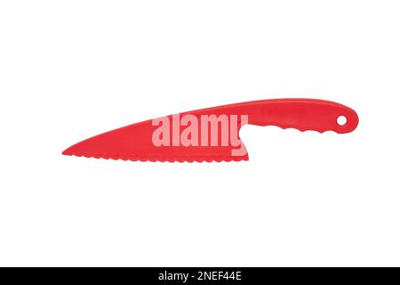 Image of a plastic knife of red color for cutting a cake on a white background Stock Photo