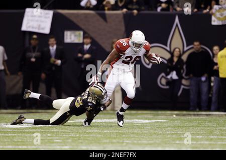 New Orleans Saints Tracy Porter (22) grabs Arizona Cardinals Beanie Wells  (26) during an NFL football divisional playoff game in New Orleans,  Saturday, Jan. 16, 2010. (AP Photo/David J. Phillip Stock Photo - Alamy