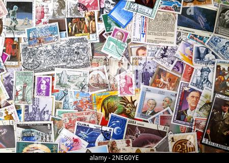 Stack of stamps from all around the world. Stock Photo