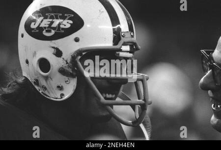 New York Jet quarterback Joe Namath stands with bowed head after being  injured in the first quarter of the Jets-Colt game at Memorial Stadium on  Sept. 23, 1973, in Baltimore, Maryland. Namath