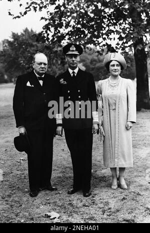 Winston Churchill with the King and Queen inspecting bomb damage at ...