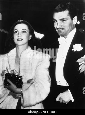 Actor Laurence Olivier with his wife after receiving his Knighthood ...