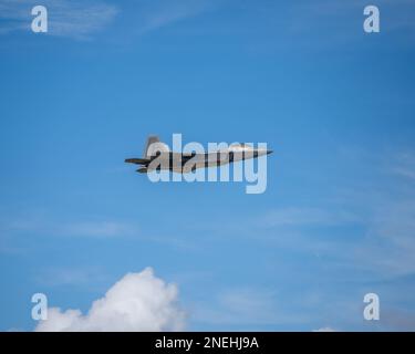 A F-22 Raptor shows off its skills in an aerial acrobatic demonstration ...