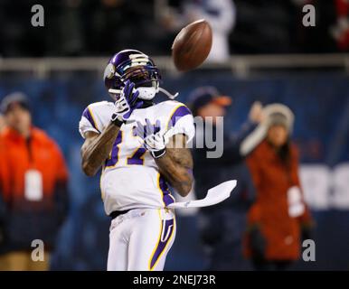 Chicago Bears receiver Bernard Berrian (80) runs past San Francisco 49ers  defenders Shawntae Spencer (36) and Tony Parrish (33) after catching a pass  for a 49-yard touchdown in the first quarter Sunday