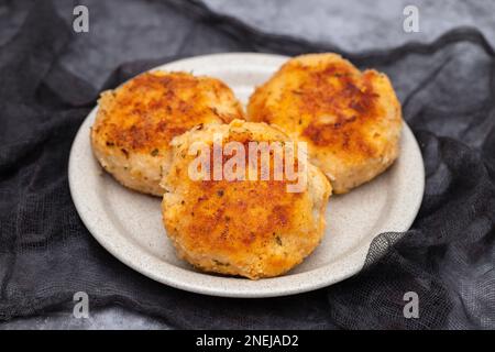 Turkey cutlets from minced meat on dish. Pan-fried meatballs. Stock Photo