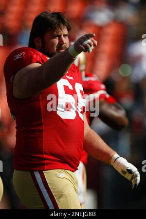 San Francisco 49ers center Eric Heitmann (66) and quarterback Alex Smith  during an NFL football game Sunday, Nov. 22, 2009, in Green Bay, Wis.  between the Green Bay Packers and the San