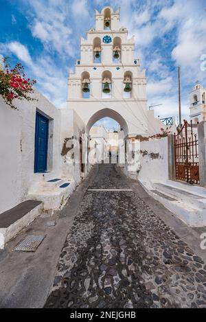 Characteristic arched passage under a bell tower in Megalochori village, Santorini Stock Photo