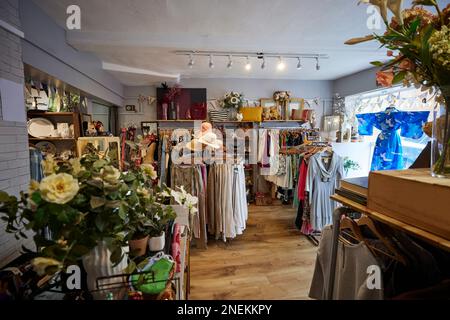 Interior Of Charity Shop Or Thrift Store Selling Used And Sustainable Clothing And Household Goods Stock Photo