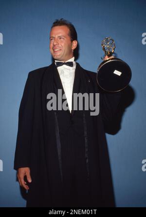 **FILE PHOTO** Bruce Willis' Family Announce Dementia Diagnosis. Bruce Willis at the 39th Annual Primetime Emmy Awards on September 20, 1987 at the Pasadena Civic Auditorium in Pasadena, California Credit: Ralph Dominguez/MediaPunch Stock Photo