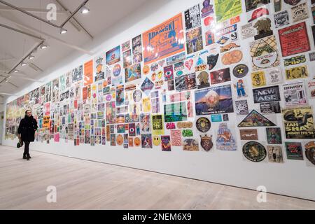 London, UK. 16th Feb, 2023. LONDON, UNITED KINGDOM - FEBRUARY 16, 2023: A gallery staff member looks at The Mott Collection: Wall if Noise 1976 - 2000 by Toby Mott during a press view for Beyond The Streets, the most comprehensive graffiti & street art exhibition to open in the UK, at Saatchi Gallery in London, United Kingdom on February 16, 2023. The exhibition (17 February - 9 May 2023) will feature works of over 100 artists spread over all three floors of London's iconic Saatchi Gallery. (Photo by WIktor Szymanowicz/NurPhoto) Credit: NurPhoto SRL/Alamy Live News Stock Photo