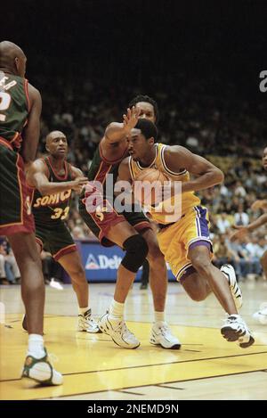 Sam Perkins of the Seattle Supersonics in action against Robert Horry  News Photo - Getty Images