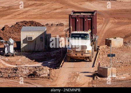 A container truck loaded with hazardous waste pulls through the weigh station at the UMTRA tailings project in Moab, Utah. Stock Photo