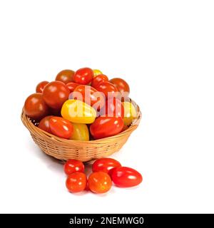Various mini tomatoes against a white background Stock Photo