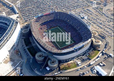 Giants Stadium, right, is seen during an NFL football game between New York  Jets and the Carolina Panthers Sunday, Nov. 29, 2009, in East Rutherford,  N.J. To the left of Giants Stadium