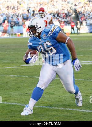 San Diego Chargers Brandon Manumaleuna runs froms a Kansas City Chiefs  defender during the third quarter of an NFL football game Sunday Nov. 29,  2009 in San Diego. The Chargers won 43-14. (