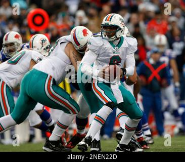 Miami Dolphins backup quarterback Mike White bangs a drum before