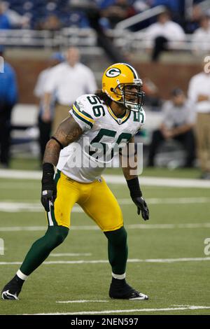 Green Bay Packers linebacker Nick Barnett (56) stops Chicago Bears running  back Thomas Jones (20) for a 1-yard loss during the first quarter at  Soldier Field in Chicago on December 31, 2006. (