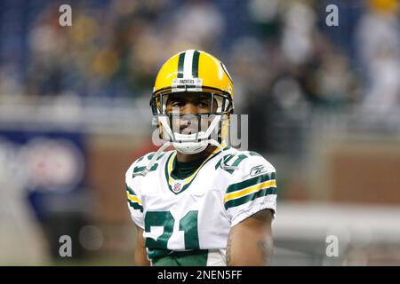 Green Bay Packers cornerback Charles Woodson breaks up a pass