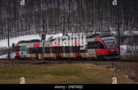 Austria red fast nice passenger trains in Micheldorf station 02 10 2023 Stock Photo