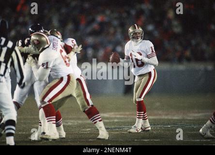 San Francisco 49ers? quarterback Joe Montana searches for a receiver during  third quarter action in the NFC championship game against the Chicago Bears  in Chicago, Sunday, Jan. 8, 1989. Montana completed 17 of 27 passes for 288  yards including