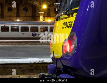 Northern Rail class 170 and class 155 trains at York railway station going nowhere during a RMT signallers strike in January 2023, Northern rail logo. Stock Photo