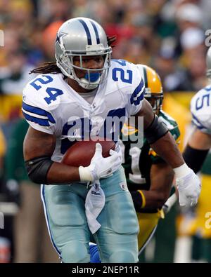 Dallas Cowboys Marion Barber runs by New York Giants Chris Canty