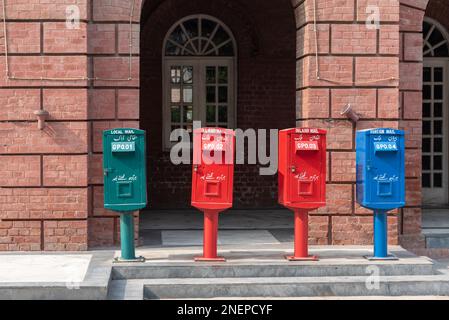 LAHORE,PAKISTAN-SEP 24,2016-Mail boxes of Pakistan State Post erected outside a local post office. Stock Photo
