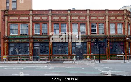 CARDIFF, WALES - JULY 2019: Cars queuing at traffic lights to get into car  parks in Cardiff city centre. In the background is The Golden Cross pub  Stock Photo - Alamy