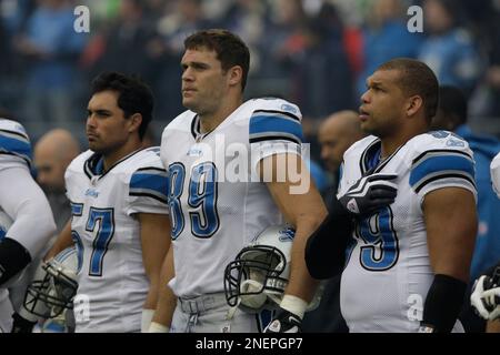 Detroit Lions' Dewayne White (99) goes up against Washington