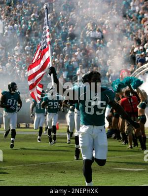 Jacksonville Jaguars receiver Ernest Wilford goes up for a catch during the  teams first day of football training camp, Saturday, July 29, 2006, in  Jacksonville, Fla. Wilford caught 41 passes for 681