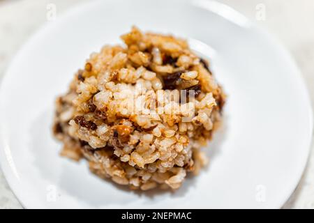 Kutya or kutia cereal rice dish macro closeup of Russia and Ukraine Christmas Eve traditional meal made with raisins and honey, Stock Photo