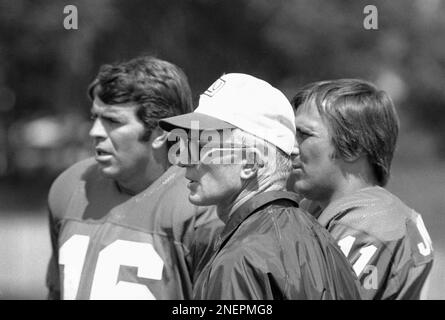 New York Giant coach Y.A. Tittle, center, stands on the sidelines on July  24, 1972 with quarterbacks Norm Snead, left and Randy Johnson during  picture day at the giants training camp at