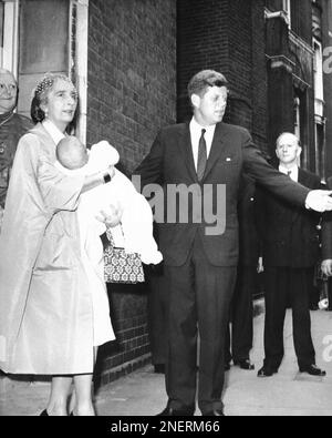 John F Kennedy after the christening of Anna Christina Radziwill who is ...