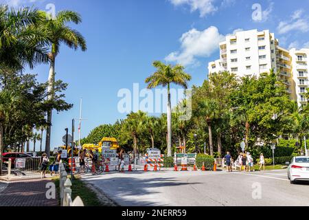Naples, USA - December 28, 2021: Vanderbilt beach in Florida southwest with access road closed under construction and people on sunny winter day with Stock Photo