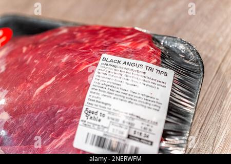 Naples, USA - May 14, 2022: Label sign closeup of packaged raw beef black angus tri tip steak with price bought at Seed to Table store in Florida Stock Photo