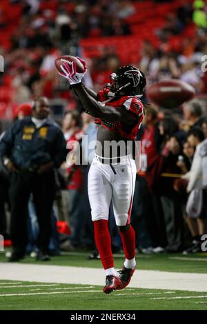 Fans watch as the Atlanta Falcons play the Carolina Panthers in the third  quarter of their NFL football game at the Georgia Dome in Atlanta Sunday,  Sept. 20, 2009. (AP Photo/Dave Martin