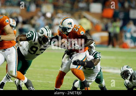 Ronnie Brown, center, a running back from Auburn, is joined by