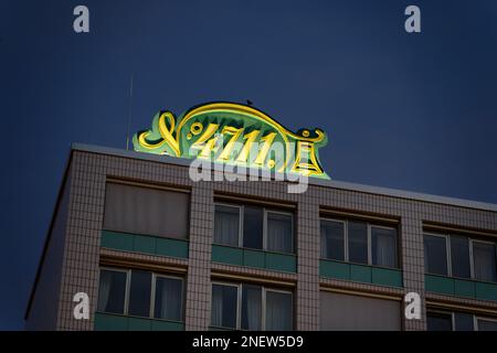 Cologne, Germany February 10 2023: illuminated logo of 4711 eau de Cologne on the former administration building of the perfume factory in cologne ehr Stock Photo