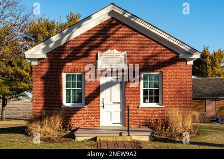 Old anandoned red brick one room schoolhouse in Bureau county, Illinois. Stock Photo