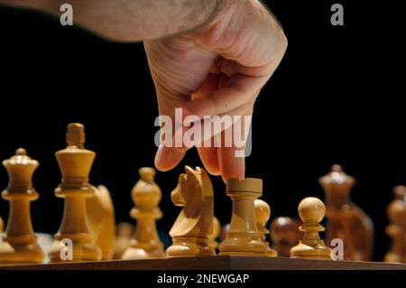 Former chess world champions Garry Kasparov, right, and Anatoly Karpov,  left, play an exhibition rematch in Valencia, Spain, Tuesday, Sept. 22,  2009. Chess eminences Kasparov and Karpov are dusting off their knights