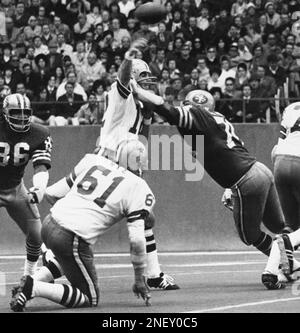 Roger Staubach of the Dallas Cowboys scrambles with the ball against