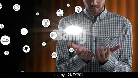 Composition of businessman touching screen with digital online icons. global technology, digital interface and communication concept digitally generat Stock Photo