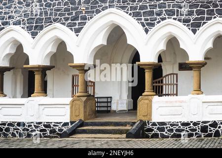 beautiful symmetrical  arch pattern front view of old temple inside the galle fort sri lanka. Stock Photo