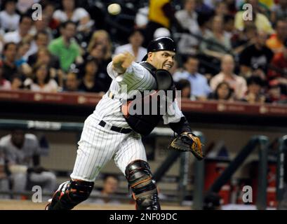 The Houston Astros' Ivan Rodriguez beat the throw to Minnesota Twins catcher  Joe Mauer to tie the game in the seventh inning. The Astros defeated the  Twins, 6-5, at the Metrodome in