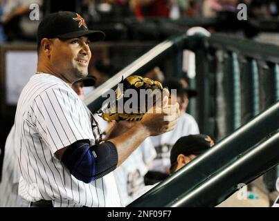 Houston Astros' Carlos Lee looks at Colorado Rockies relief pitcher Manuel  Corpas after Corpas hit Lee with a pitch in the ninth inning of the Astros'  4-1 victory in a baseball game
