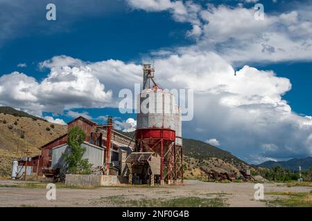 This industrial plant in Colorado has been shut down and abandoned and is slowly falling prey to the elements. Stock Photo