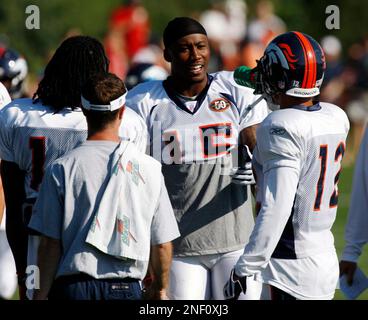 Denver Broncos wide receivers, from left, Travis Shelton, Eddie Royal,  Brandon Marshall, Chad Jackson, Brandon Stokley and Jabar Baffney joke with  photographers during a break in drills at NFL football training camp