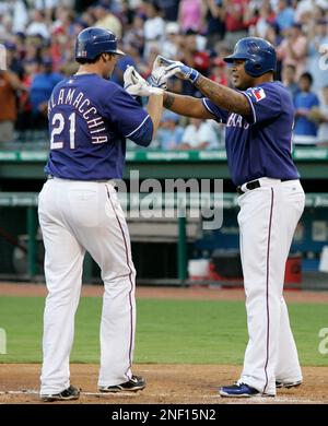 Texas Rangers' Michael Young during batting practice prior to a Major  League Baseball game against the Los Angeles Angels, Tuesday, July 8, 2008,  in Arlington, Texas. (AP Photo/Tony Gutierrez Stock Photo - Alamy